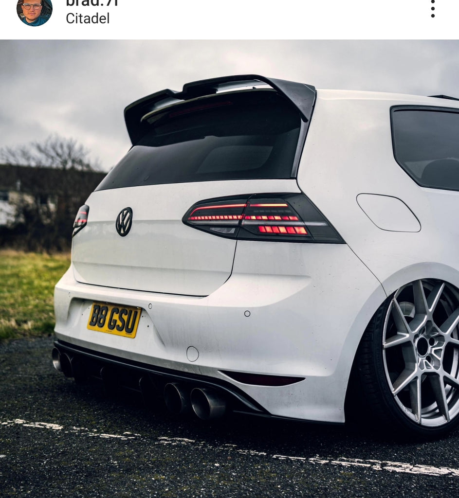 Slammed VW Golf R with some short 3D gel plates